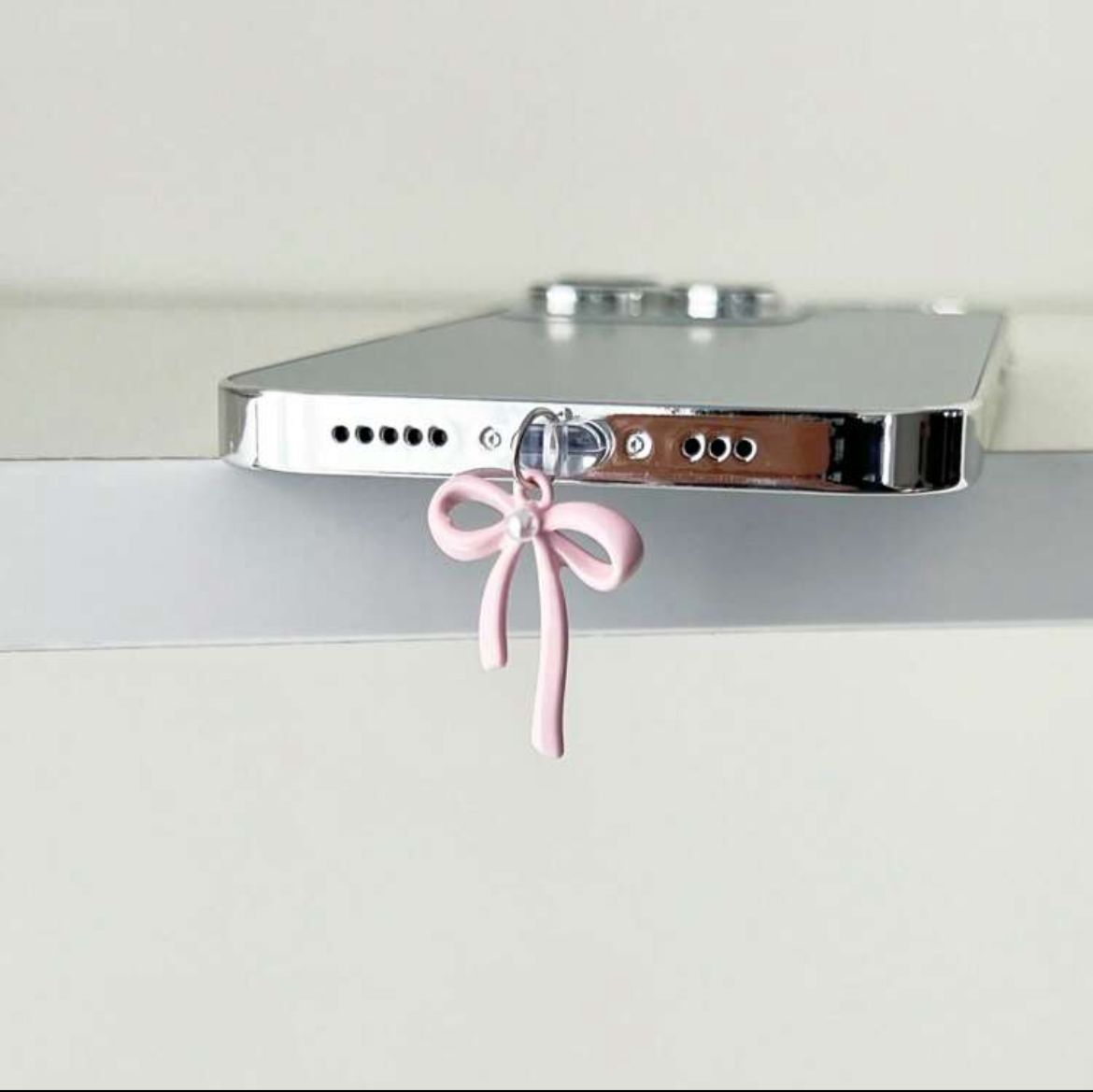 Pin Anti polvo Moño